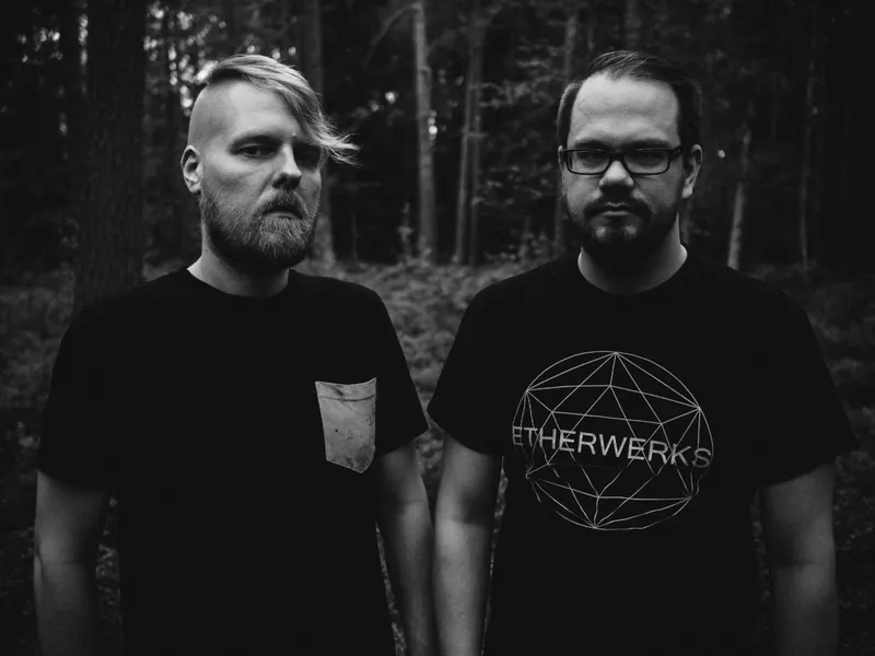 Black and white promotional photo of Out Of Fuel duo posing outdoors